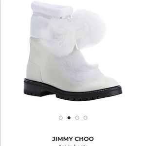 White, furry, Jimmy Choo fashion boots.